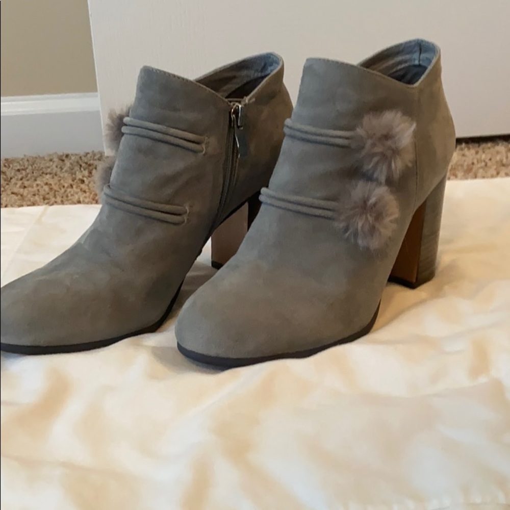 Suede booties with fur Pom poms
